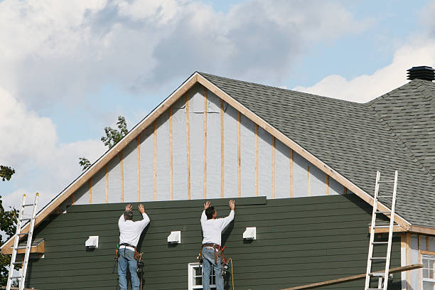 Professional Siding Replacement technician working in Haw River, NC